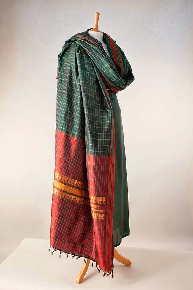 Silk sari in rich dark green with dark red pallu